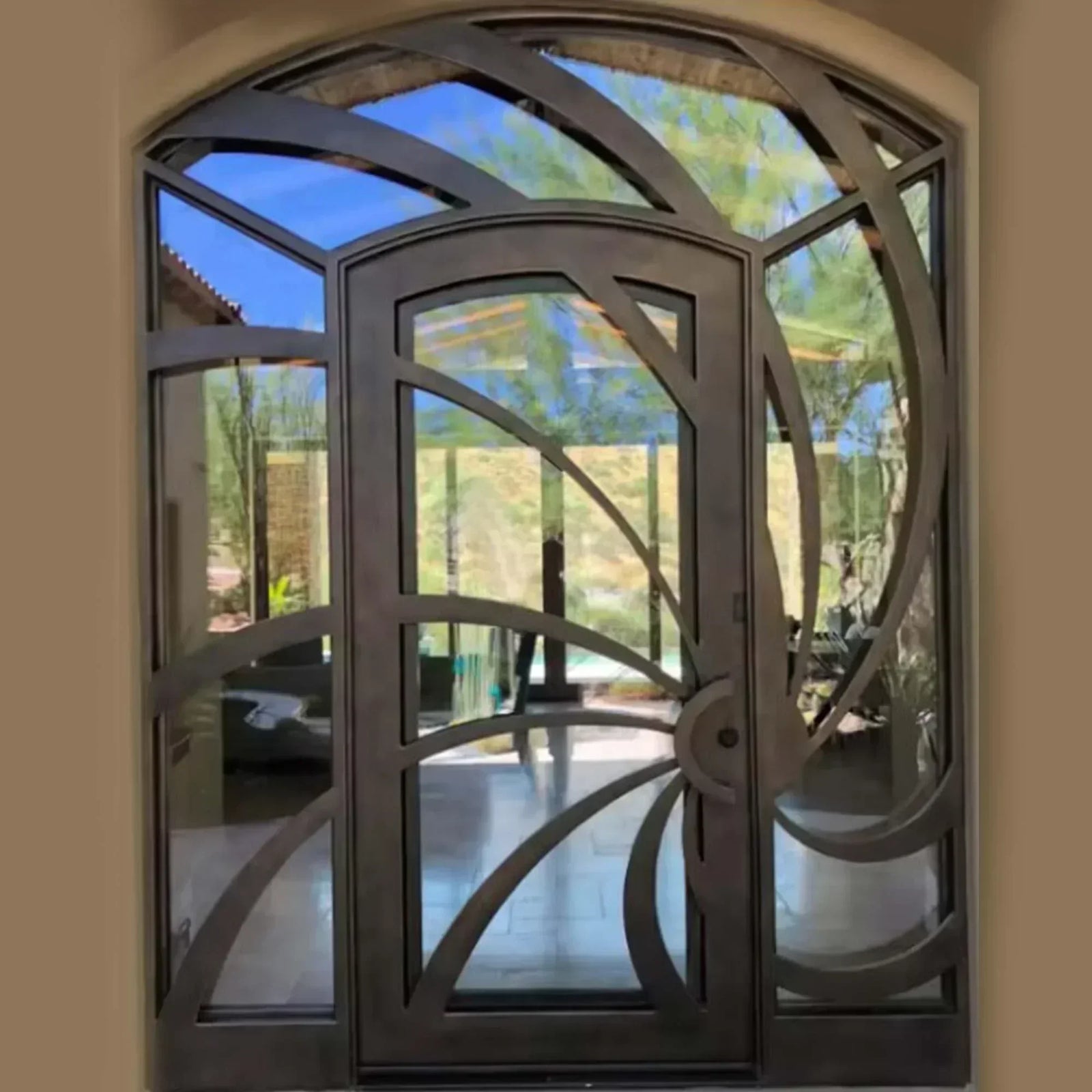IWD-eleglant-steel-single-entrance-door-clear-glass-CID-128-radiant-curved-line-arched-top-with-transom-sidelights-ironwroughtdoors