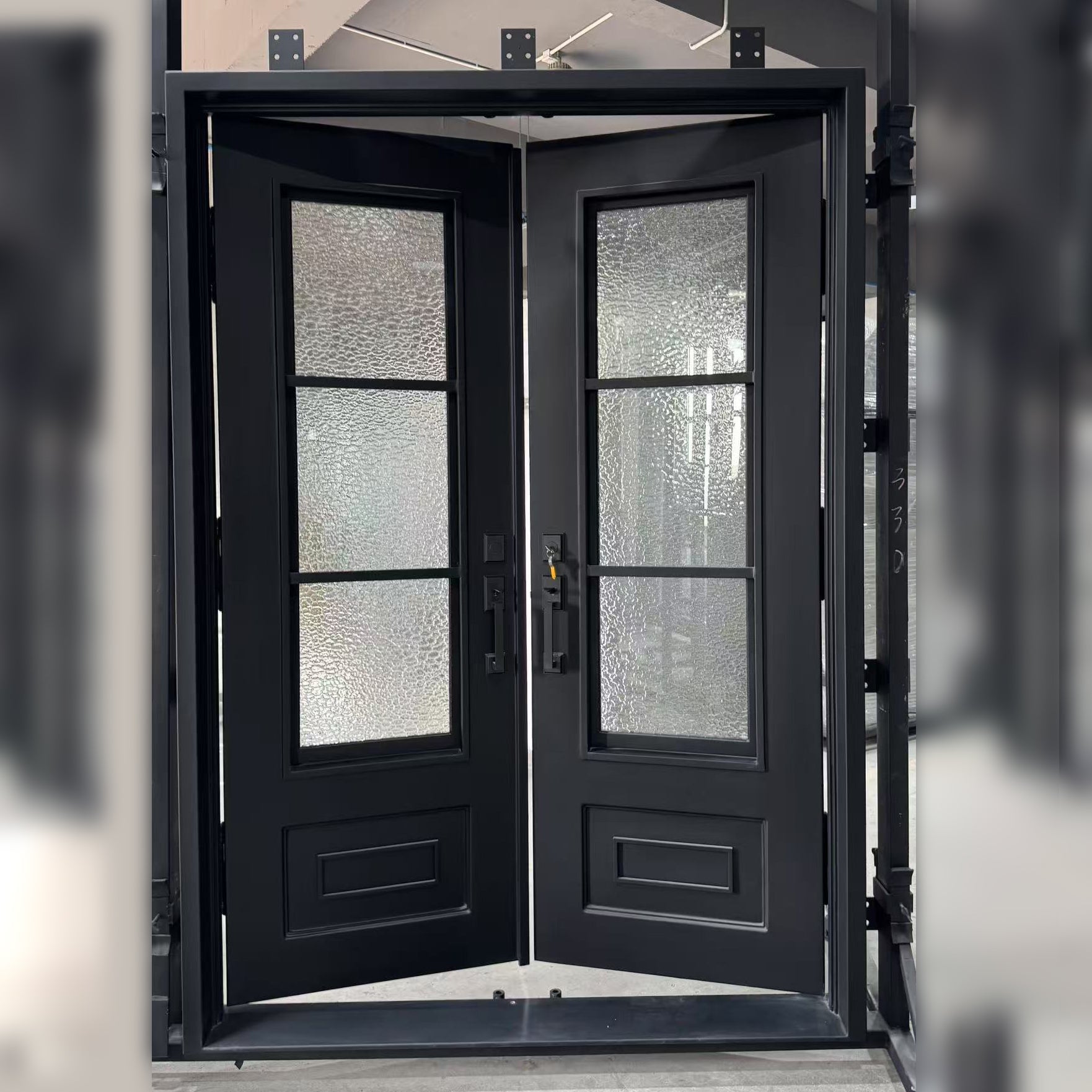 iwd-in-stock-hurricane-resistant-double-door-aquatex-glass-kickplate-detail-ironwroughtdoors