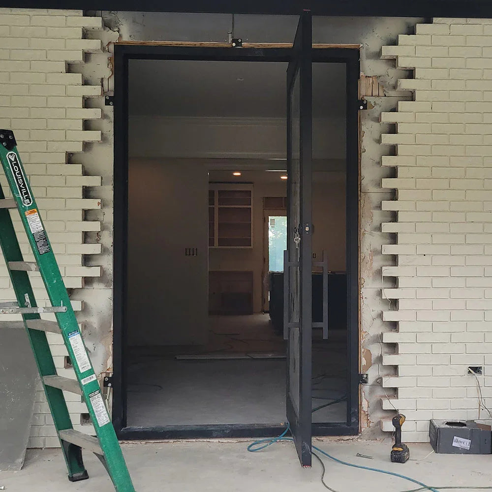 wrought-iron-exterior-pivot-door-with-1-Lite-glass-panel-and-square-top